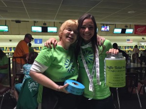 Volunteers Carol & Nicole sell raffle tickets